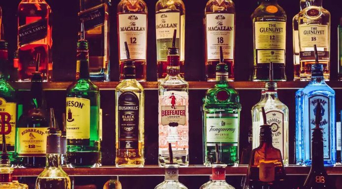 various liquor bottles displayed on shelves