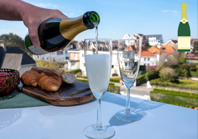 pouring a Brut Champagne on terrace