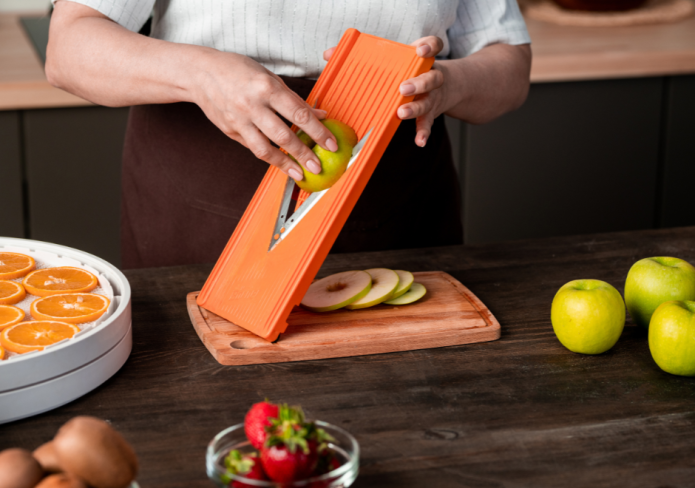 mandoline slicer in use