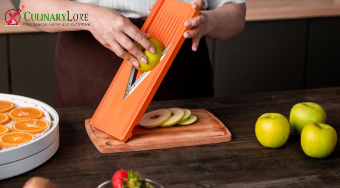 Mandoline style French vegetable slicer in use