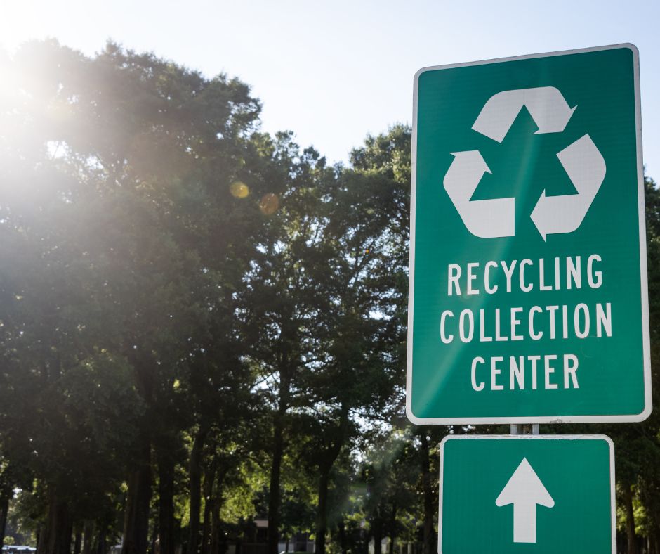 sign directing to recycling collection center