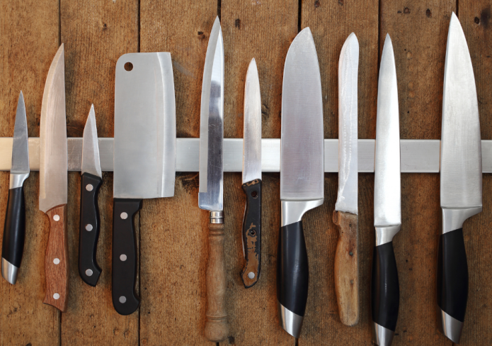 kitchen knives stored on magnetic strip