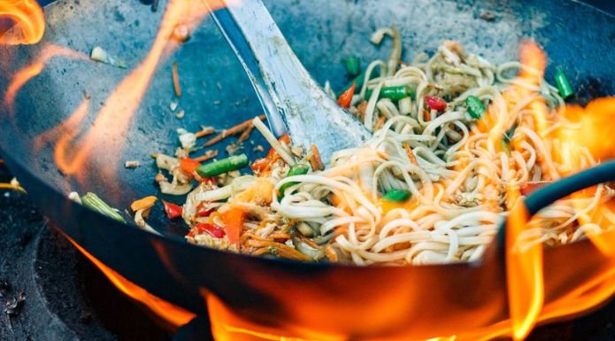 stir-fry noodles in wok