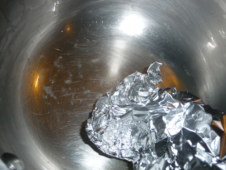 vinegar to scrub white spots from pans