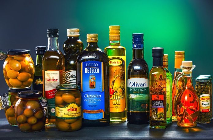 various bottles of olive oil available in grocery stores