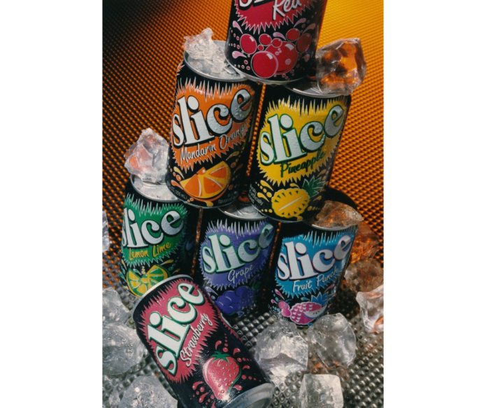 Assorted Slice soda cans showing several fruit flavors