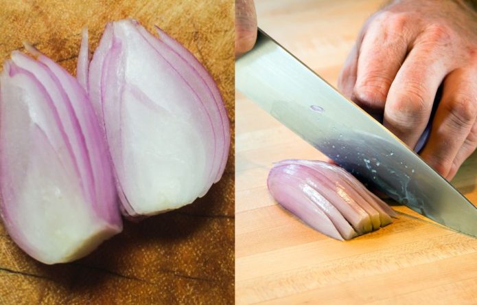 shallot cut open and chopping shallot clove on cutting board