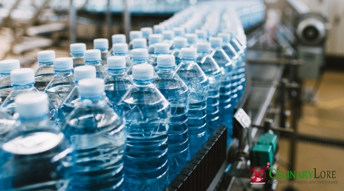 water bottles on manufacturing line conveyor belt
