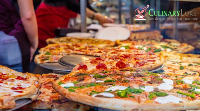 Pizzas on display at Pizza shop for pizza sold by the slice