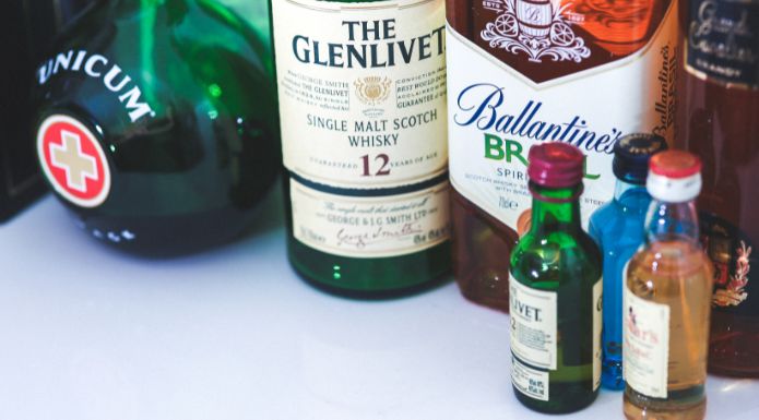 Why is alcohol called spirits? A collection of scotch whisky bottles.