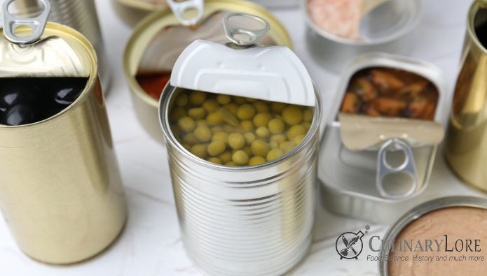 Canned foods partially opened to show water and food contents. 